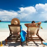 Couple lying on beach